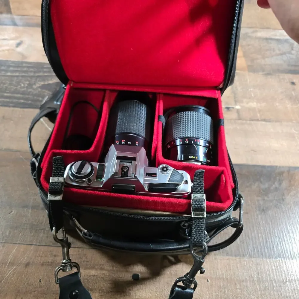 Minolta X370 with a JC Penny f=80 to 200mm zoom lens and prospect f=28-70mm lens